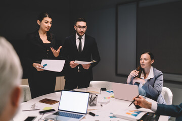 Group of businesspeople discussing project in conference room