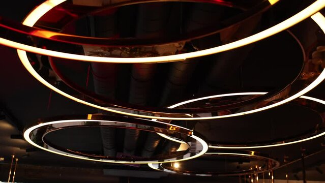 round LED chandelier modern on the ceiling in the room