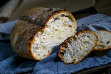 loaf of bread on wooden table