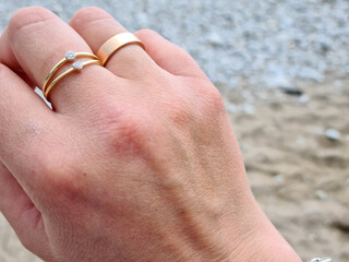 Fototapeta premium wedding rings on the hand