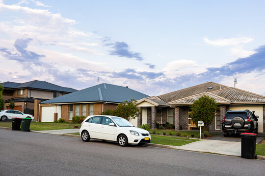 Car parked on street of residential area of country town in NSW Australia - Powered by Adobe