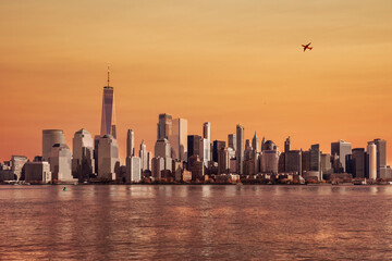 Amazing panoramic view of New York City skyline and skyscraper at sunset. Beautiful view of downtown Manhattan