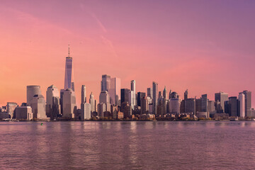Fototapeta na wymiar Amazing panoramic view of New York City skyline and skyscraper at sunset. Beautiful view of downtown Manhattan