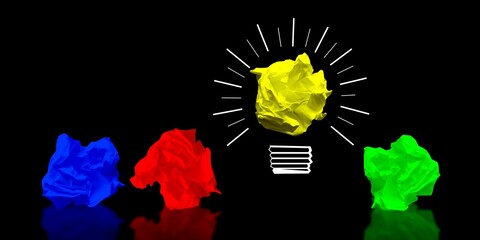Colorful paperballs light bulbs on black background - idea, creativity concept