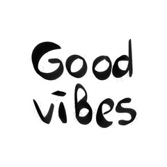 black and white handwritten phrase "good vibes"