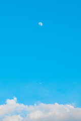 moon, blue sky and clouds