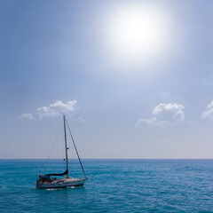 Fototapeta premium sailing yacht among emerald sea at sunny day, sea travel scene