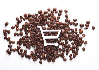 Paper cut shopping trolley with coffee beans on white background
