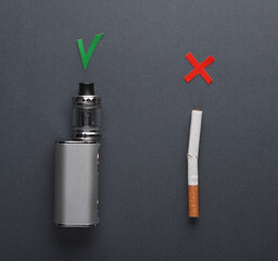 Vaping device with checkmark accept sign and cigarette with reject cross symbol on dark background
