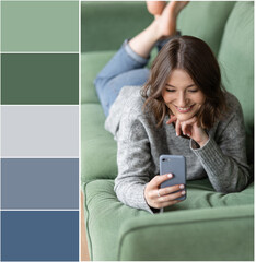 Design palette inspired by beautiful young woman in grey sweater and jeans on green sofa . Designer...