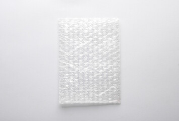 Shockproof wrapping film with bubbles for transportation on a gray background