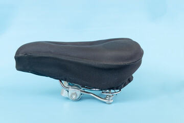 bicycle saddle cover, part of a bicycle, isolated on blue background