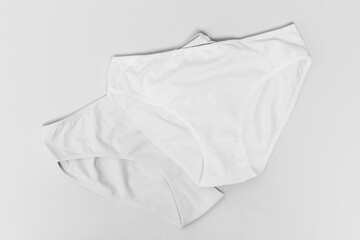 pair women's panties made of cotton close-up top view black and white photo