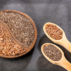 Linum usitatissimum - Salvia hispanica. Organic seed in the spoons