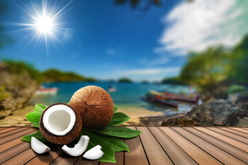 Coconuts fruits on a table in front of a tropical sea