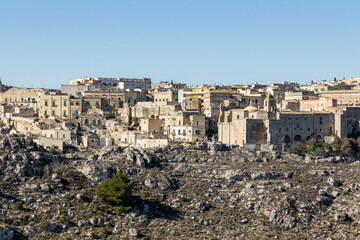Panorama of Matera, a UNESCO World Heritage Site. European Capital of Culture. View from the Murgia Park. Timeless walk inside Paleolithic caves. City similar to Jerusalem. Unforgettable journey