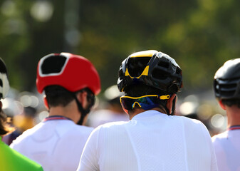 cyclist with helmet to head protection during the cycling race