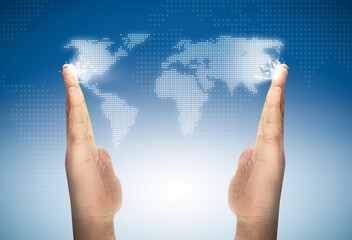 dotted world map among the hands over a blue background