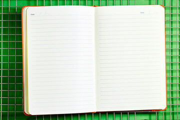 agenda book or notebook above fancy background