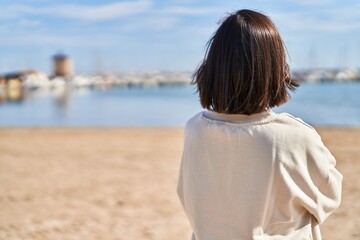 Middle age woman standing at seaside