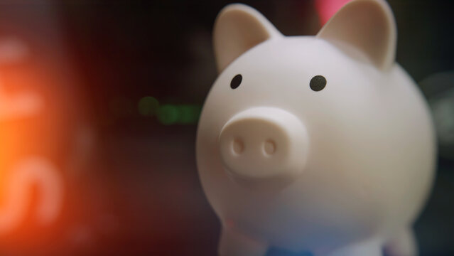 Blurred piggy bank post focus on after, background image for font