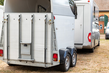 Horse box cargo trailer transport and horse transportation van at farm or ranch. Horsebox carriage...