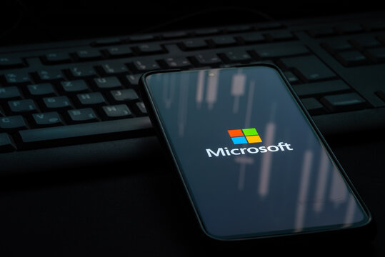 Ljubljana, Slovenia - 21 January 2023: Microsoft logo on smartphone screen laying on computer keyboard