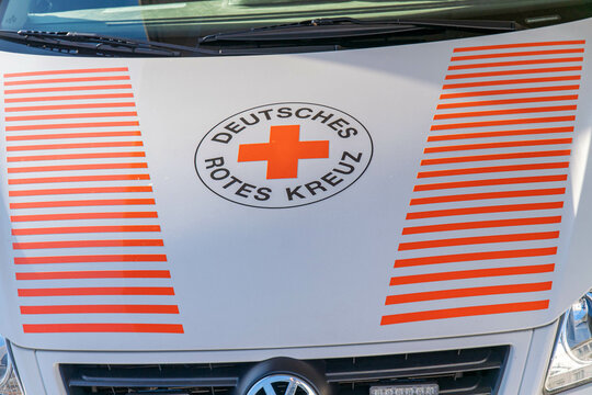 Engine bonnet with the logo of the German Red Cross of an ambulance Emergency vehicle