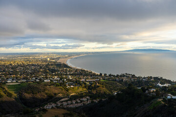 Sunset views from the Santa Monica Mountains while hiking, looking down on the city of Los Angeles and the Santa Monica Bay.