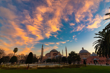 Fototapeta na wymiar Hagia Sophia or Ayasofya Mosque at sunrise with dramatic clouds