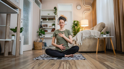 One woman sit on the floor practice online guided meditation self care