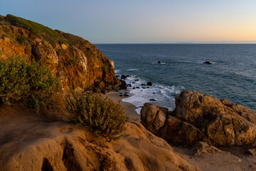 Sunset views from the Santa Monica Mountains while hiking, looking down on the city of Los Angeles and the Santa Monica Bay.