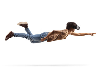 Full length shot of an african american man flying and wearing a vr headset