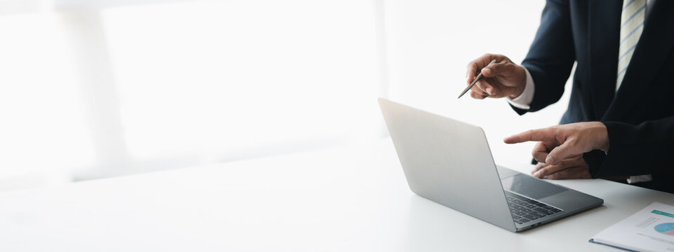 The sales department is having a monthly summary meeting to bring it to the department manager, they are verifying the correctness of the documents that are prepared before bringing in to the manager