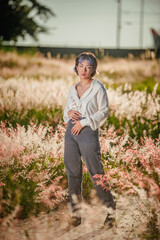 Beautiful asian young colorful hair lady  at the outdoors field.