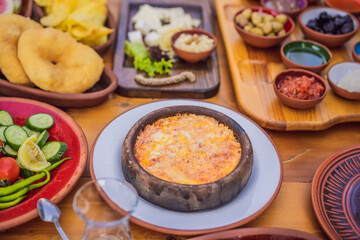 Menemen, Turkish breakfast, eggs with peppers and tomatoes, top view