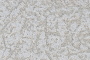Fototapeta na wymiar Abstract stone textured grey building wall background.
