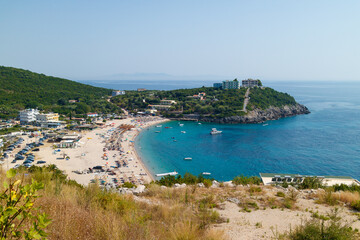 Fototapeta na wymiar Beach leisure on Adriatic Sea: bay with sandy beach in South Albania. 