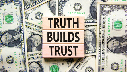 Truth builds trust symbol. Concept words Truth builds trust on wooden blocks on a beautiful...