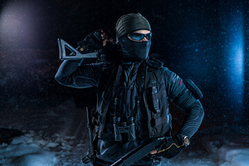 Fototapeta premium Military man winter posing at night