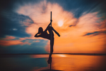 Woman pole dancing