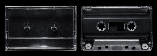 Clear cassette tape and cassette case set on isolated black background