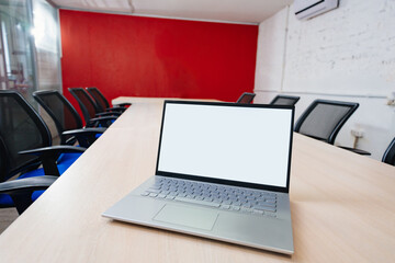 laptop in room for negotiations and meetings. a modern business space