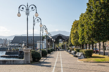Naklejka premium The promenade of Intra with the iron canopy of the landing stage in background