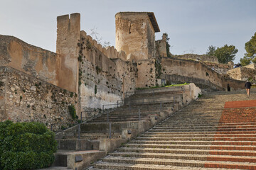 A long staircase in an ancient stone fortress