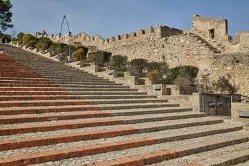 A long staircase in an ancient stone fortress