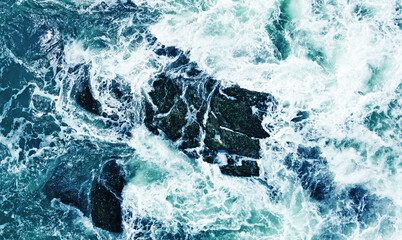 Aerial view of the sea storm waves. Beautiful ocean wallpaper for tourism and advertising. Asian landscape, photo from the drone