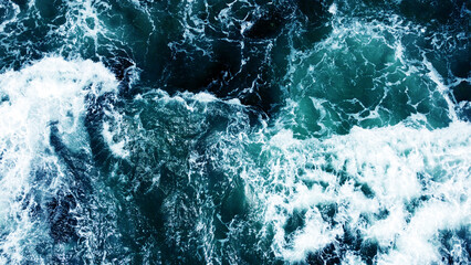 Aerial view of the sea storm waves. Beautiful ocean wallpaper for tourism and advertising. Asian landscape, photo from the drone