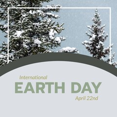 Fototapeta premium Image of international earth day text over fir tree forest in snow