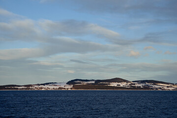 Fototapeta na wymiar Helgøya Island in Lake Mjøsa in the evening light a winter day.